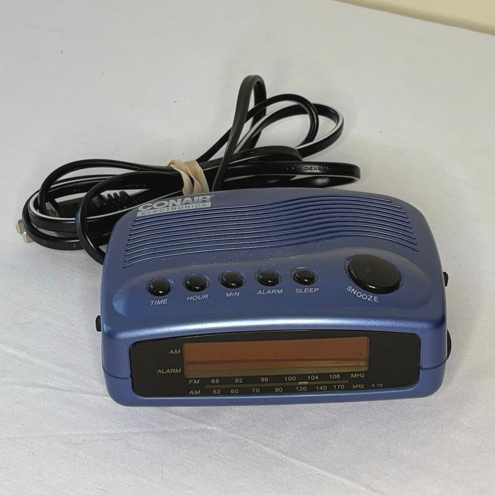 Conair CR100 AM/FM Clock Radio Purple